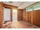 Unfinished basement with paneled walls, drop ceiling and adjacent bathroom at 454 Jo Ann Se Dr, Marietta, GA 30067