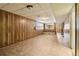 Spacious unfinished basement featuring paneled walls, bench, and tile flooring at 454 Jo Ann Se Dr, Marietta, GA 30067