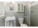 Bathroom with a vintage sink and a glass door shower at 454 Jo Ann Se Dr, Marietta, GA 30067
