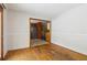View of the dining room's hardwood floors and access to the kitchen at 454 Jo Ann Se Dr, Marietta, GA 30067