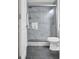 Bathroom features an enclosed tiled shower with updated fixtures at 552 Micayne Se Cir # 1, Smyrna, GA 30082