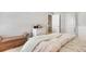 Bedroom with neutral colors and bench at 552 Micayne Se Cir # 1, Smyrna, GA 30082