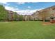 Beautiful townhome community featuring a well-manicured lawn and charming architecture at 552 Micayne Se Cir # 1, Smyrna, GA 30082