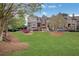 Serene community with lush green lawn and mature trees, perfect for enjoying the outdoors at 552 Micayne Se Cir # 1, Smyrna, GA 30082