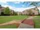 Picturesque community with lush lawns and charming red footbridges, creating a serene ambiance at 552 Micayne Se Cir # 1, Smyrna, GA 30082