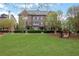 Beautifully landscaped community featuring manicured lawns and charming footbridges, perfect for outdoor activities at 552 Micayne Se Cir # 1, Smyrna, GA 30082