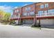 Charming brick townhomes featuring two-car garages and cozy balconies, a perfect blend of convenience and comfort at 552 Micayne Se Cir # 1, Smyrna, GA 30082