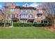 Charming brick townhouse featuring a well-manicured lawn and classic architectural details at 552 Micayne Se Cir # 1, Smyrna, GA 30082