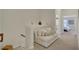 Hallway with sitting area leading to a bedroom and laundry room at 552 Micayne Se Cir # 1, Smyrna, GA 30082