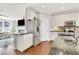 Bright kitchen features stainless appliances, granite countertops, and eat-in area with lots of natural light at 552 Micayne Se Cir # 1, Smyrna, GA 30082