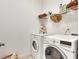 Laundry room featuring a white washer and dryer with wire rack at 552 Micayne Se Cir # 1, Smyrna, GA 30082