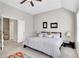 Spacious main bedroom featuring vaulted ceilings and ensuite bathroom at 552 Micayne Se Cir # 1, Smyrna, GA 30082