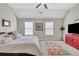 Spacious main bedroom featuring vaulted ceilings, a red cabinet and ensuite bathroom at 552 Micayne Se Cir # 1, Smyrna, GA 30082