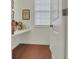 Bright pantry with built-in shelving perfect for storing beverages and snacks at 552 Micayne Se Cir # 1, Smyrna, GA 30082