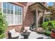 Charming outdoor patio featuring comfortable seating and attractive landscaping at 552 Micayne Se Cir # 1, Smyrna, GA 30082
