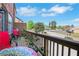 Outdoor patio area with seating, wooden railings, and views of the surrounding neighborhood at 552 Micayne Se Cir # 1, Smyrna, GA 30082