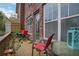 Private patio area featuring outdoor seating, a brick exterior, and a tranquil atmosphere at 552 Micayne Se Cir # 1, Smyrna, GA 30082