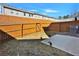 Fenced backyard offers privacy and space for outdoor activities at 2240 Mulsanne Dr, Lithonia, GA 30058