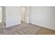 Bedroom featuring neutral carpet and closet at 2240 Mulsanne Dr, Lithonia, GA 30058