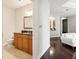 Bathroom adjacent to the living room with granite counters and tile floors at 325 E Paces Ferry Ne Rd # 810, Atlanta, GA 30305