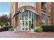 Beautiful brick building featuring the main entrance with canopy and manicured landscaping at 325 E Paces Ferry Ne Rd # 810, Atlanta, GA 30305