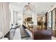 Inviting common space with ample seating and a long wooden table, perfect for gatherings at 325 E Paces Ferry Ne Rd # 810, Atlanta, GA 30305