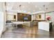 Spacious common area featuring a game table, modern decor, a large TV, and an open kitchen area at 325 E Paces Ferry Ne Rd # 810, Atlanta, GA 30305