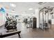 Bright gym with modern equipment, including treadmills, ellipticals, and weight machines at 325 E Paces Ferry Ne Rd # 810, Atlanta, GA 30305