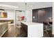 Modern kitchen area adjacent to a common living space with stylish seating and elegant decor at 325 E Paces Ferry Ne Rd # 810, Atlanta, GA 30305
