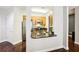 Updated kitchen featuring stainless appliances, wood cabinets and granite countertops at 325 E Paces Ferry Ne Rd # 810, Atlanta, GA 30305