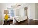 Bright living room features hardwood floors, a ceiling fan, and access to a balcony at 325 E Paces Ferry Ne Rd # 810, Atlanta, GA 30305