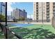 A well-maintained community tennis court provides residents with a convenient recreational amenity at 325 E Paces Ferry Ne Rd # 810, Atlanta, GA 30305
