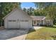 Charming single-story home with a two-car garage and well-maintained lawn at 5623 Yeager Dr, Douglasville, GA 30135