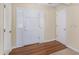 Bright foyer featuring a large front door, sidelights, and hardwood flooring at 5623 Yeager Dr, Douglasville, GA 30135