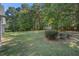 Expansive backyard with lush greenery and mature trees, offering privacy at 5623 Yeager Ridge Dr, Douglasville, GA 30135
