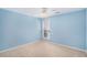 Bedroom with blue walls and carpeting features a window for natural light at 5623 Yeager Ridge Dr, Douglasville, GA 30135