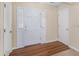 Welcoming foyer with hardwood floors and a paneled front door at 5623 Yeager Ridge Dr, Douglasville, GA 30135