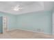 Spacious carpeted main bedroom features a tray ceiling and neutral walls at 5623 Yeager Ridge Dr, Douglasville, GA 30135