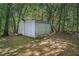 Storage shed nestled in the woods at 5623 Yeager Ridge Dr, Douglasville, GA 30135