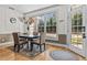 Charming dining area with a view of the backyard at 168 Jersey Rd, Oxford, GA 30054