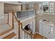 Inviting foyer with grand staircase and large chandelier, offering an impressive entrance at 168 Jersey Rd, Oxford, GA 30054