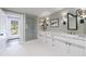 Bathroom featuring double vanity and marble countertops at 202 Lakeview Ave, Atlanta, GA 30305