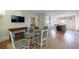 Well-lit dining area with table and chairs, adjoining kitchen and living spaces, ideal for gatherings at 202 Lakeview Ave, Atlanta, GA 30305