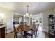 Elegant dining room with hardwood floors, classic furnishings, and seamless transitions to other living spaces at 202 Lakeview Ave, Atlanta, GA 30305