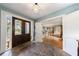 Spacious foyer with stone floors and a view into the living room at 202 Lakeview Ave, Atlanta, GA 30305