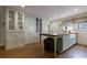 Bright kitchen features custom cabinets, a large island, and hardwood floors at 202 Lakeview Ave, Atlanta, GA 30305