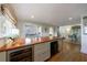Gourmet kitchen features custom cabinets, wooden countertops and stainless steel appliances at 202 Lakeview Ave, Atlanta, GA 30305