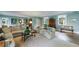 Spacious living room with hardwood floors, comfortable seating, and a calming color scheme at 202 Lakeview Ave, Atlanta, GA 30305
