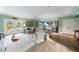 Large living room features hardwood floors, beautiful paint, and tons of space at 202 Lakeview Ave, Atlanta, GA 30305