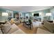Spacious living room with hardwood floors, comfortable seating, and a calming color scheme at 202 Lakeview Ave, Atlanta, GA 30305